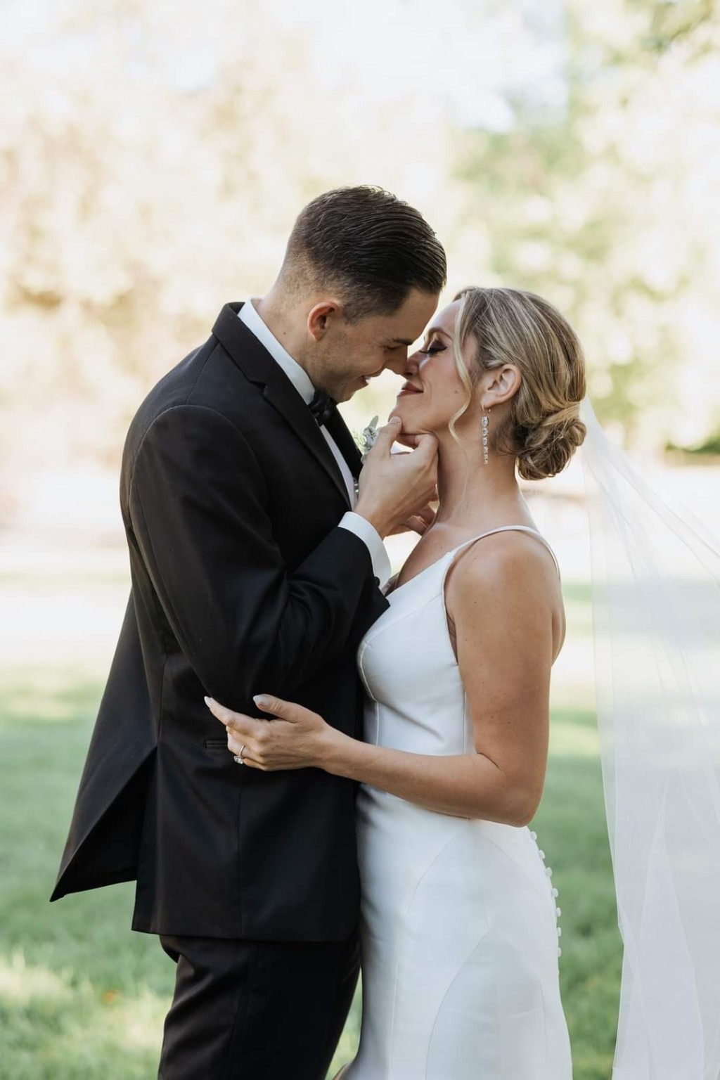 Bride and groom sharing a quiet wedding-day moment